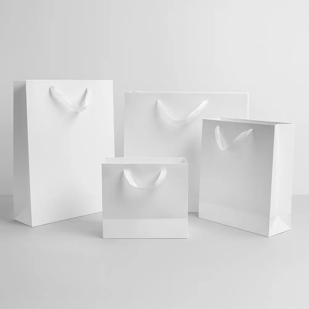 שקית קרטון לבנה +ידית ריבס (4 מידות לבחירה)