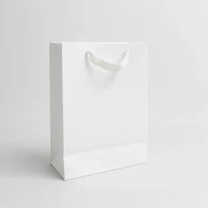 שקית קרטון לבנה +ידית ריבס 24X28+10